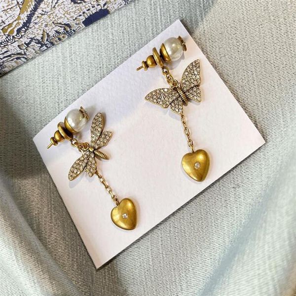 fashion designer butterfly dragonfly asymmetry dangle earrings vintage pearl eardrop stud for lady women party wedding lovers gift3289, Silver
fashion designer butterfly dragonfly asymmetry dangle earrings vintage pearl eardrop stud for lady women party wedding lovers gift3289, Silver