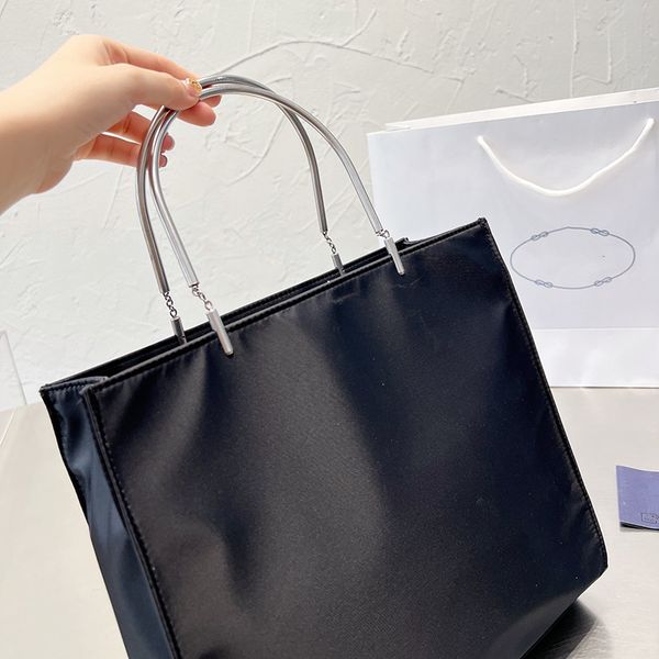 designer women pp nylon vintage tote bag italy milano brand metal handle totes handbags lady laser engraving logo large shopping handbag lux 
designer women pp nylon vintage tote bag italy milano brand metal handle totes handbags lady laser engraving logo large shopping handbag lux