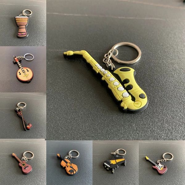 fashion classic guitar keychain car key chain silicone key ring musical instruments pendant accessories man women gift, Silver
fashion classic guitar keychain car key chain silicone key ring musical instruments pendant accessories man women gift, Silver