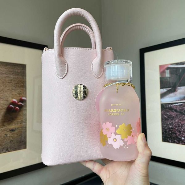 mugs 2021 starbucks cup cherry blossom season cherry blossom powder bag glass water cup 390ml
mugs 2021 starbucks cup cherry blossom season cherry blossom powder bag glass water cup 390ml