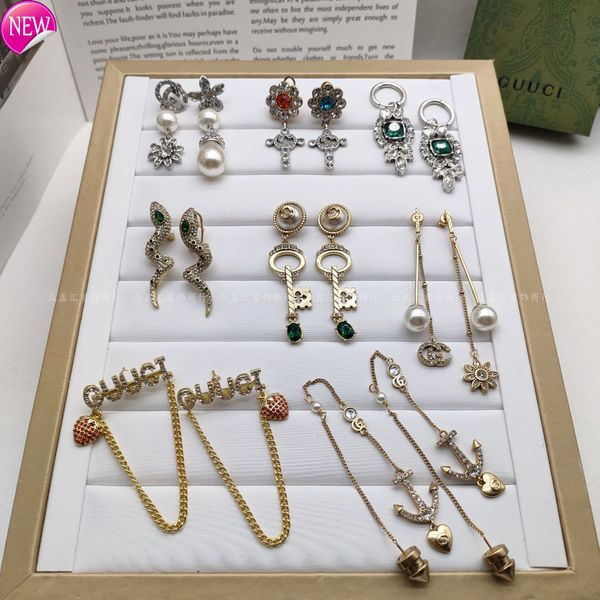 luxury brand design earrings g's 2022 new asymmetric color letter earrings small exaggerated style long strawberry pendant letter, Golden;silver
luxury brand design earrings g's 2022 new asymmetric color letter earrings small exaggerated style long strawberry pendant letter, Golden;silver