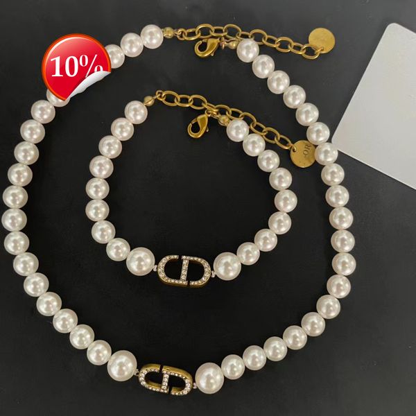 luxury design women's necklace new cd letter pearl earrings d family classic net red same old bracelet set, Silver
luxury design women's necklace new cd letter pearl earrings d family classic net red same old bracelet set, Silver