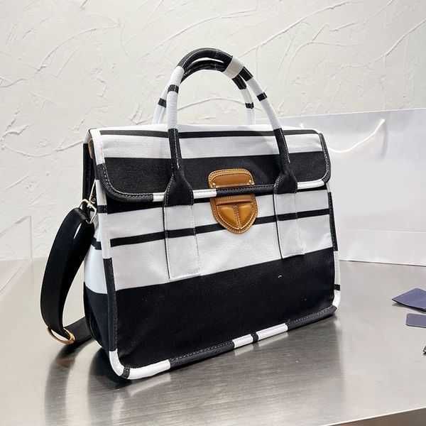 canvas shopping bag large capacity handbag lady tote bags stripe hardware buckle embroidered letters detachable wide strap women shoulder pd
canvas shopping bag large capacity handbag lady tote bags stripe hardware buckle embroidered letters detachable wide strap women shoulder pd