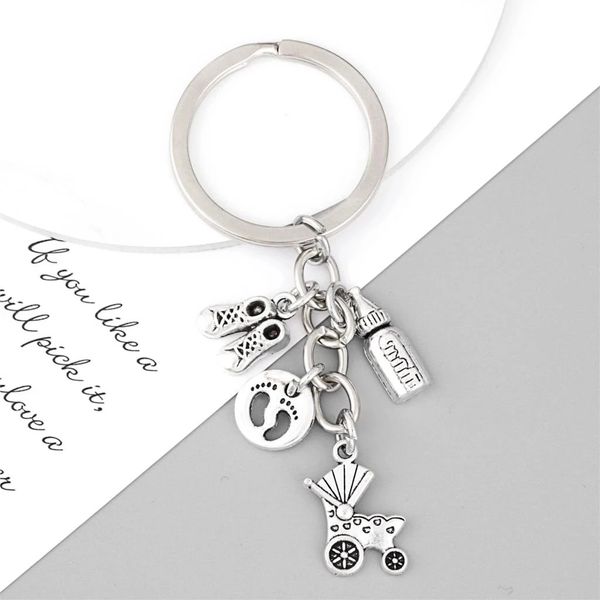 1 piece keychain baby stroller bottle key ring cute shoes mother's cradle theme mother's day souvenir jewelry, Silver
1 piece keychain baby stroller bottle key ring cute shoes mother's cradle theme mother's day souvenir jewelry, Silver