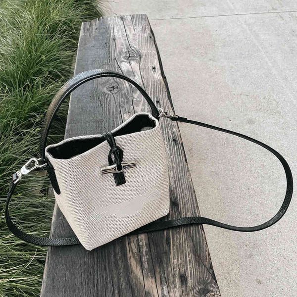 drawstring wang same french drago bag one shoulder hand canvas bucket bamboo knot bag messenger 220906
drawstring wang same french drago bag one shoulder hand canvas bucket bamboo knot bag messenger 220906