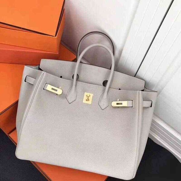 designer handbag herme bags cowhide togo tchi pattern bag leather fashion birkins mother tot bag large capacity portable
designer handbag herme bags cowhide togo tchi pattern bag leather fashion birkins mother tot bag large capacity portable