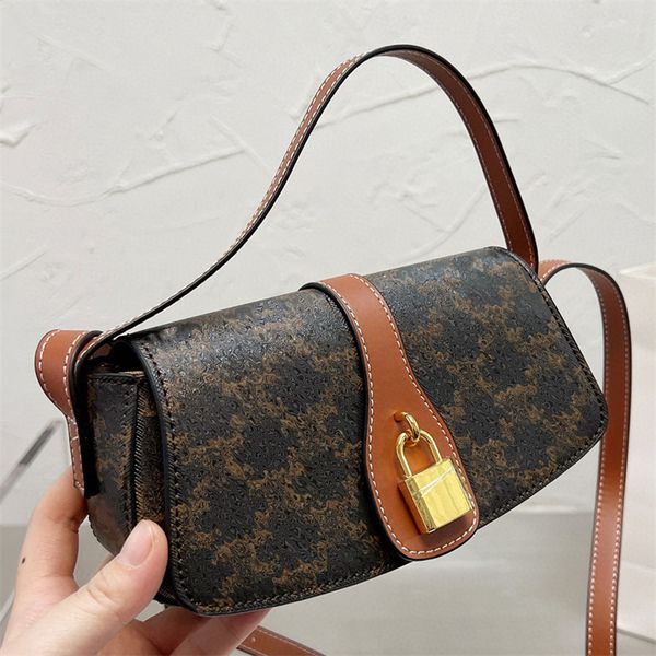 clutch bag on strap tabou in triomphe canvas and calfskin flap with decorative lock snap button closure designer bags smooth leather underar
clutch bag on strap tabou in triomphe canvas and calfskin flap with decorative lock snap button closure designer bags smooth leather underar