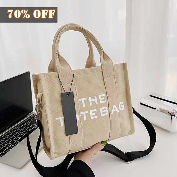 the tote bags large capacity practical women cosmetic bag canvas square handbag famous design bag casual shopping shoulder bag solid color f
the tote bags large capacity practical women cosmetic bag canvas square handbag famous design bag casual shopping shoulder bag solid color f