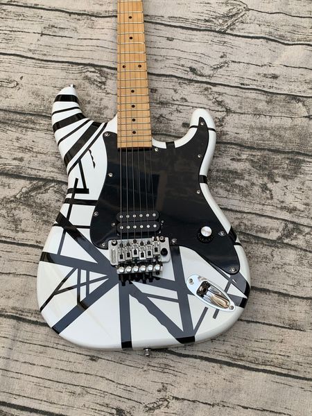maple fingerboard black and white stripe electric guitar frets binding quality guitar.
maple fingerboard black and white stripe electric guitar frets binding quality guitar.
