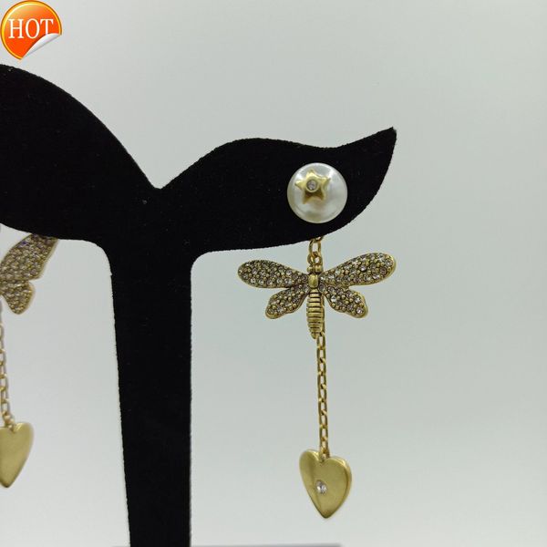 d family di new pearl earrings female butterfly dragonfly asymmetric of diamonds light luxury love hearts factory direct sale, Golden
d family di new pearl earrings female butterfly dragonfly asymmetric of diamonds light luxury love hearts factory direct sale, Golden