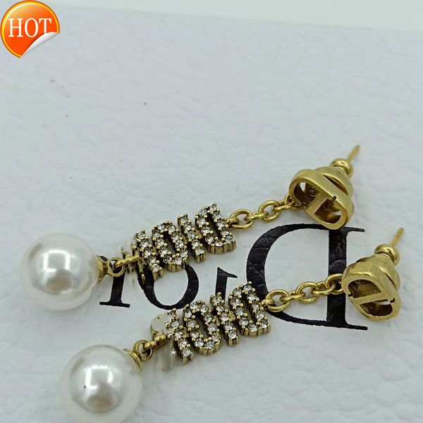 d family dijia earrings 925 sier needle new fringe letter cd pearl female pendant batch factory direct sale, Golden
d family dijia earrings 925 sier needle new fringe letter cd pearl female pendant batch factory direct sale, Golden