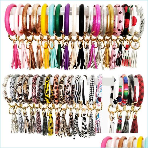 charm bracelets pu leather wristlet keychain bracelet o circle bangle keyring fashion prints tassel bracelets key holder for women gi dh7no, Golden;silver
charm bracelets pu leather wristlet keychain bracelet o circle bangle keyring fashion prints tassel bracelets key holder for women gi dh7no, Golden;silver