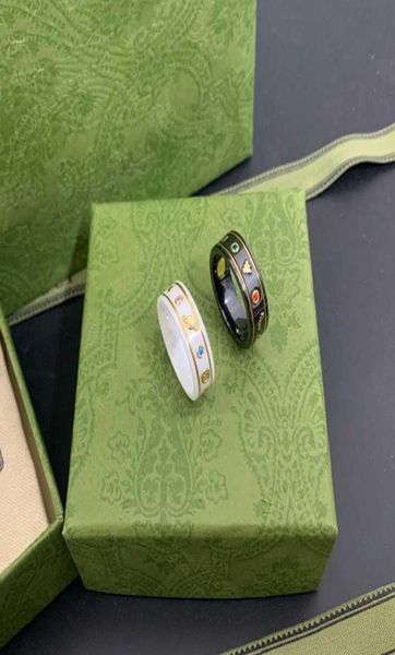 double g ring 925 silver ceramic black and white letter element bee planet 
double g ring 925 silver ceramic black and white letter element bee planet