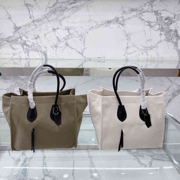 totes classic designer handbag tote bag women canvas smile handbags leather shoulder bags purse lady shopping purse 220719
totes classic designer handbag tote bag women canvas smile handbags leather shoulder bags purse lady shopping purse 220719