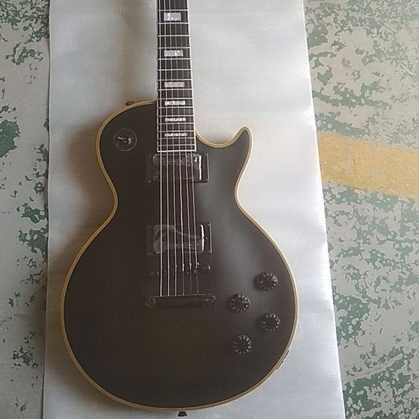 customized matt black finish all black hardware electric guitar with ebony fretboard and fret binding
customized matt black finish all black hardware electric guitar with ebony fretboard and fret binding