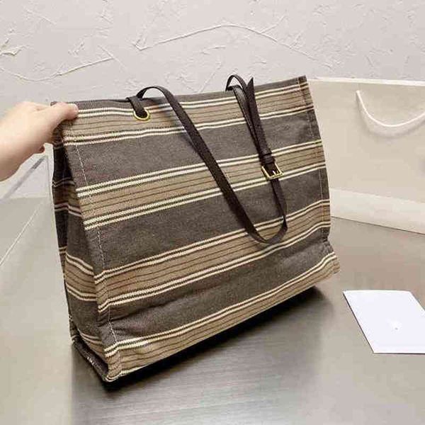 totes large capacity canvas tote bags luxury stripes simple handbag leather designer female one-shoulder shopping adjustable hand strap 2203
totes large capacity canvas tote bags luxury stripes simple handbag leather designer female one-shoulder shopping adjustable hand strap 2203
