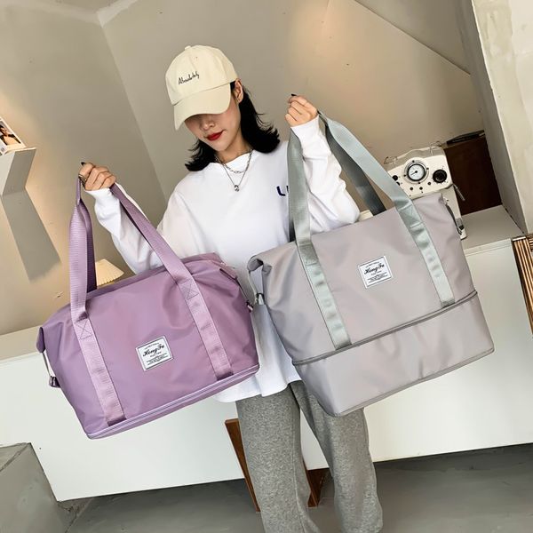 duffel bags large capacity travel female male portable folding waterproof gym organizer men women handbags 220908
duffel bags large capacity travel female male portable folding waterproof gym organizer men women handbags 220908