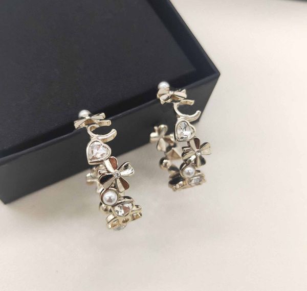 2022 charm flower shape with crystal and diamond drop earring half round have box stamp ps7968, Golden
2022 charm flower shape with crystal and diamond drop earring half round have box stamp ps7968, Golden