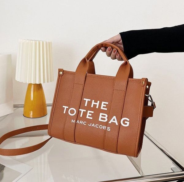 crossbody hand-held canvas bag women's one-shoulder letter simple casual large-capacity fashion women's bags
crossbody hand-held canvas bag women's one-shoulder letter simple casual large-capacity fashion women's bags