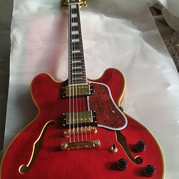 custom yellow binding & diamond logo inaly block wine red jazz electric guitar with thin semi-holow body
custom yellow binding & diamond logo inaly block wine red jazz electric guitar with thin semi-holow body