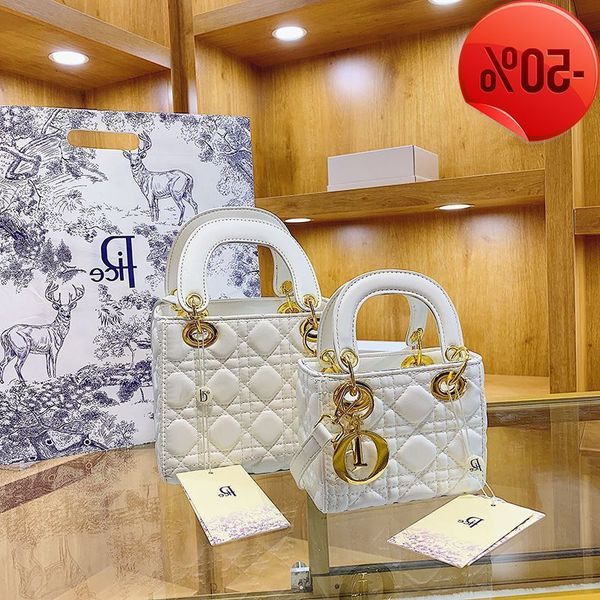 designer super small 2022 new fashion leisure simple crossbody bag women's summer versatile lingge portable diana bag factory direct sa
designer super small 2022 new fashion leisure simple crossbody bag women's summer versatile lingge portable diana bag factory direct sa