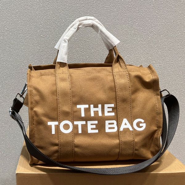 marc the tote bag handbag canvas removable wide strap zipper closure fashion letters large capacity pocket
marc the tote bag handbag canvas removable wide strap zipper closure fashion letters large capacity pocket