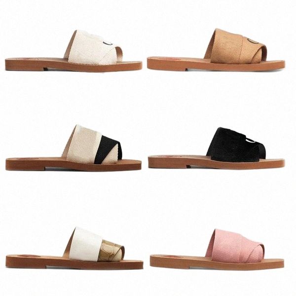 slippers women designer woody flat sandal lettering slippers calfskin canvas cross straps shoes summer beach flip flops, Black
slippers women designer woody flat sandal lettering slippers calfskin canvas cross straps shoes summer beach flip flops, Black