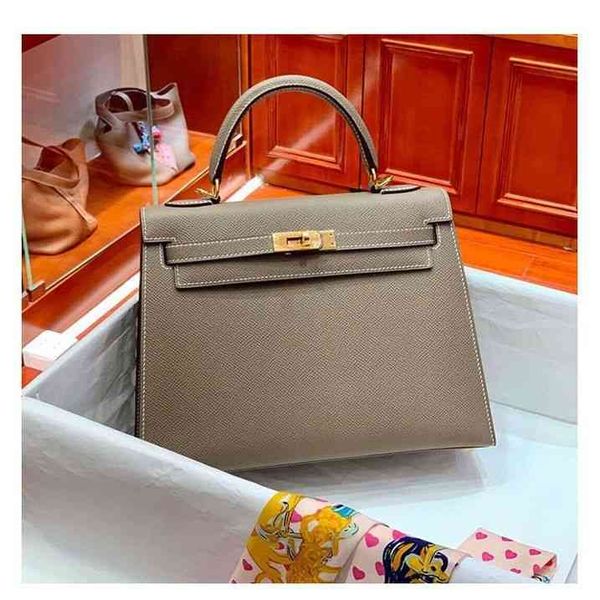 semi-handmade handbag kellies ladies portable satchel lady purse herme leather wrist new fashion mini women's real bag designer cowhide
semi-handmade handbag kellies ladies portable satchel lady purse herme leather wrist new fashion mini women's real bag designer cowhide