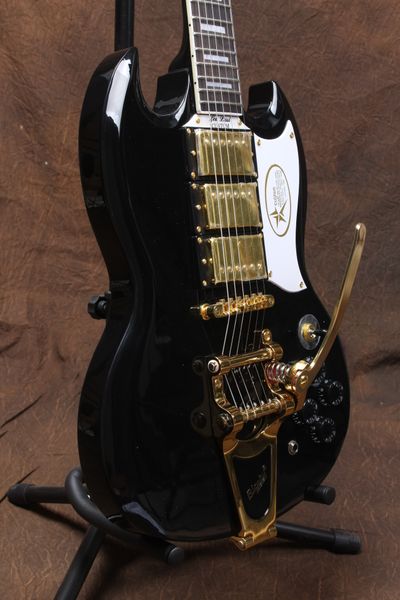 custom sg electric guitar black bodyrosewood fingerboardbig jazz vibratogold hardware three pickups
custom sg electric guitar black bodyrosewood fingerboardbig jazz vibratogold hardware three pickups