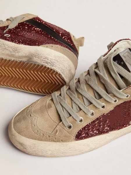 couple high small dirty shoes designer luxury italian retro mid star sneakers in burgundy glitter with dove-gray suede inserts and white
couple high small dirty shoes designer luxury italian retro mid star sneakers in burgundy glitter with dove-gray suede inserts and white
