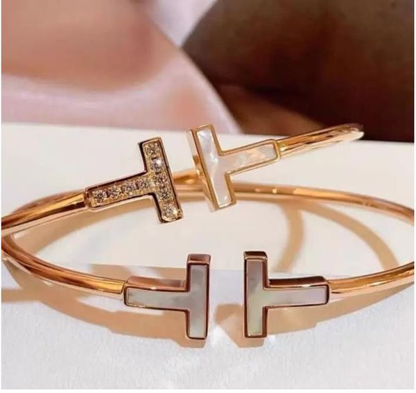 tennis 18k gold open white shell bracelets elasticity inlay rhinestone double t bracelet hand jewelry wedding, Golden;silver
tennis 18k gold open white shell bracelets elasticity inlay rhinestone double t bracelet hand jewelry wedding, Golden;silver