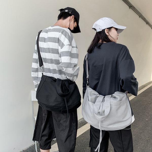 designer bag women's korean version of the drawstring canvas solid color simple shoulder messenger bags men's large-capacity handb
designer bag women's korean version of the drawstring canvas solid color simple shoulder messenger bags men's large-capacity handb