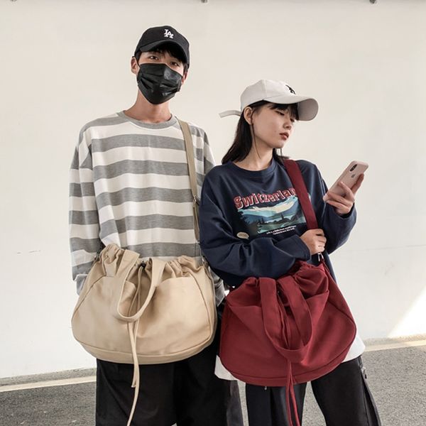 designer bag women's korean version of the drawstring canvas solid color simple shoulder messenger bags men's large-capacity handb
designer bag women's korean version of the drawstring canvas solid color simple shoulder messenger bags men's large-capacity handb