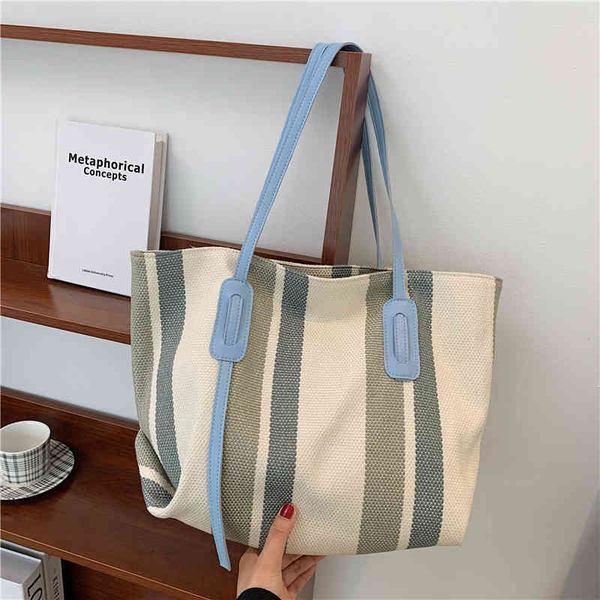 new texture canvas large capacity tote bag fashion casual stripe underarm women's bag
new texture canvas large capacity tote bag fashion casual stripe underarm women's bag
