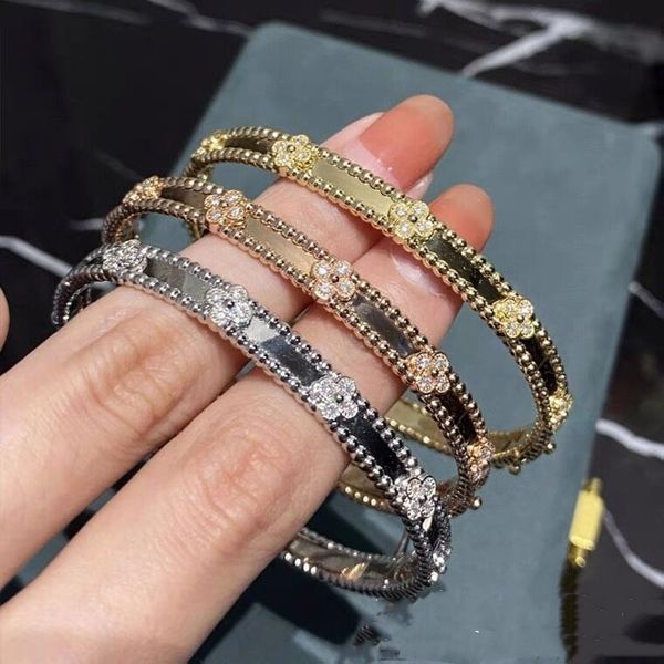 van brand designer clover bangle bracelet for women 18k gold plated full crystal four leaf perlees sweet clover flower singatural cleef cuff, Black
van brand designer clover bangle bracelet for women 18k gold plated full crystal four leaf perlees sweet clover flower singatural cleef cuff, Black