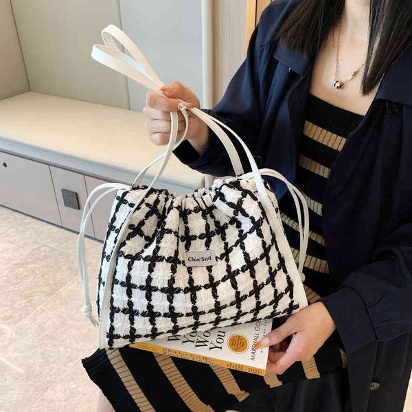 versatile style bag women's 2022 new fashion portable shoulder large capacity lattice color contrast bucket bag handbags
versatile style bag women's 2022 new fashion portable shoulder large capacity lattice color contrast bucket bag handbags