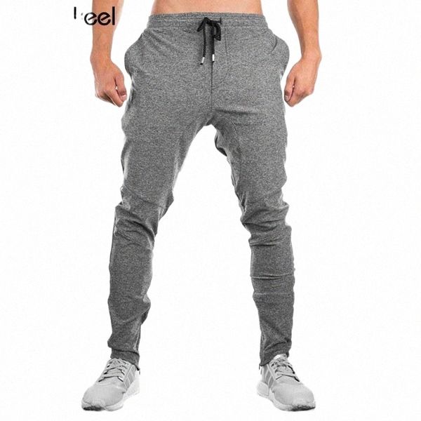 men's pants autumn mens sweatpants gyms fitness workout solid trousers male casual fashion pencil cotton pants joggers sportswear y men, Black
men's pants autumn mens sweatpants gyms fitness workout solid trousers male casual fashion pencil cotton pants joggers sportswear y men, Black