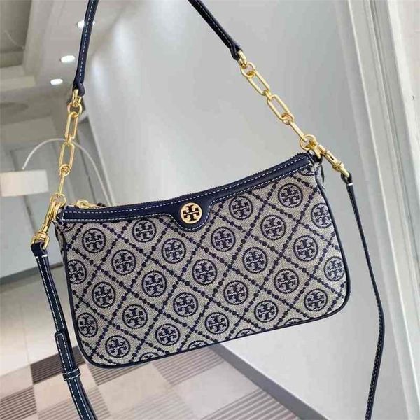 s luxury cowhide 21 s bagoutlet deigner bag canva printing one houlder lanting acro armpit hand holding envelope leiure tories burchs rse
s luxury cowhide 21 s bagoutlet deigner bag canva printing one houlder lanting acro armpit hand holding envelope leiure tories burchs rse