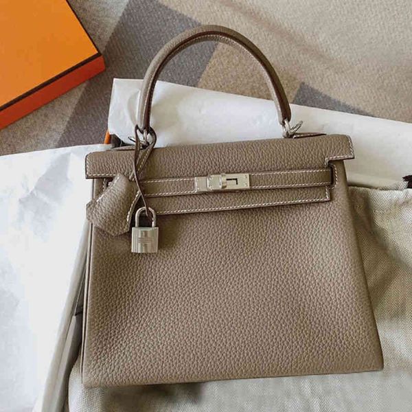 designer luxury herme bags fashion 2022 lychee grain head layer cow leather shoulder messenger bridal large capacity
designer luxury herme bags fashion 2022 lychee grain head layer cow leather shoulder messenger bridal large capacity