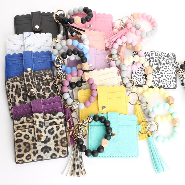 wrist keychain wallet silicone bead bracelet card bag pu tassel party favor leather key ring food grade silicon, Silver
wrist keychain wallet silicone bead bracelet card bag pu tassel party favor leather key ring food grade silicon, Silver
