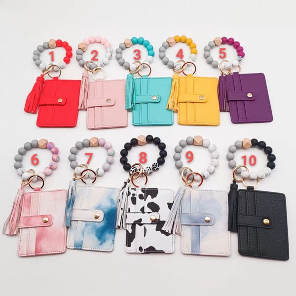wholesale food grade silicone beaded bracelet keychain leather tassel card bag pendant keyring, Silver
wholesale food grade silicone beaded bracelet keychain leather tassel card bag pendant keyring, Silver