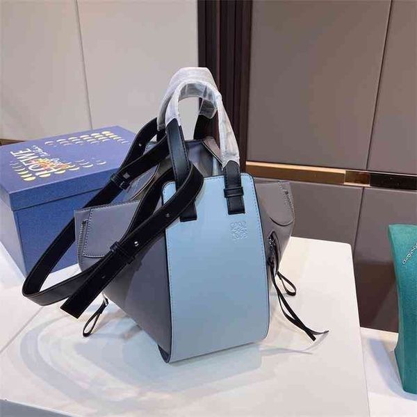 designer bag 2023 lowee vintage canvas hommack fashion handbag geometric saddle leather portable pillow embroidery lady bucket bcl9
designer bag 2023 lowee vintage canvas hommack fashion handbag geometric saddle leather portable pillow embroidery lady bucket bcl9