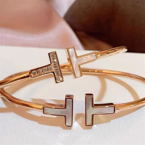18k gold open white shell bracelets elasticity inlay rhinestone double t bracelet hand jewelry wedding women's gift273y, Golden;silver
18k gold open white shell bracelets elasticity inlay rhinestone double t bracelet hand jewelry wedding women's gift273y, Golden;silver