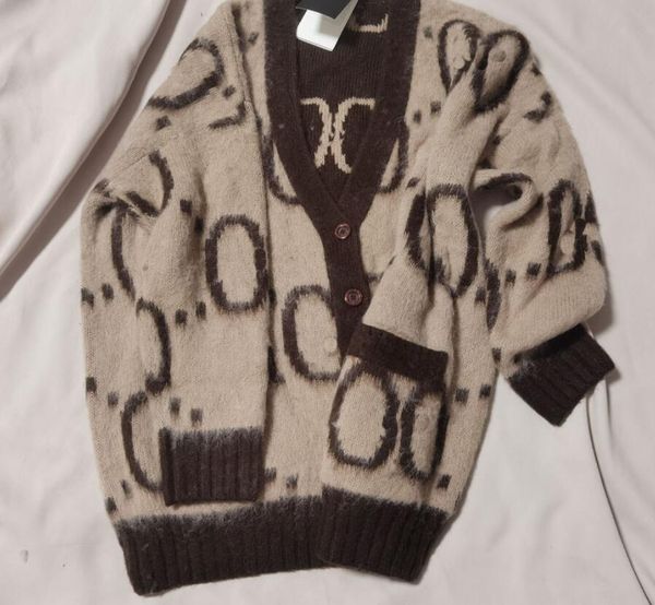 women's sweaters fashion classic brand luxry design versatile wear both sides cardigan double pockets mohair sweater coat, White;black
women's sweaters fashion classic brand luxry design versatile wear both sides cardigan double pockets mohair sweater coat, White;black