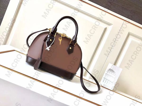 designer shell bag alma bb luxury handbag fashion satchel leather messenger bag double zip closure padlock inside flat pocket crossbody shou
designer shell bag alma bb luxury handbag fashion satchel leather messenger bag double zip closure padlock inside flat pocket crossbody shou