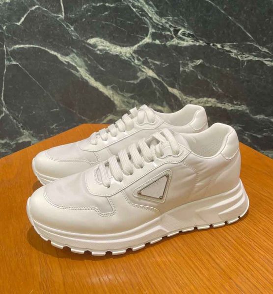 re-nylon brushed leather prax 01 sneakers shoes technical materials typical sports enamel triangle casual walking luxury comfort trainer
re-nylon brushed leather prax 01 sneakers shoes technical materials typical sports enamel triangle casual walking luxury comfort trainer