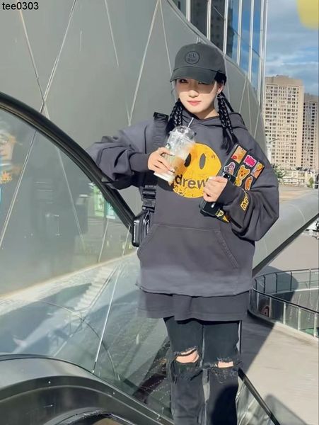 the correct version of drewss smiley face is damaged cracked and worn vintage printed hooded sweater. the student's class uniform has b, Black
the correct version of drewss smiley face is damaged cracked and worn vintage printed hooded sweater. the student's class uniform has b, Black