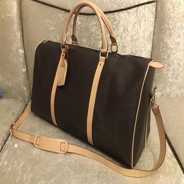 55cm leather large capacity women travel bags 2021 quality men shoulder duffel bags carry on luggage bottom rivets with lock head230a
55cm leather large capacity women travel bags 2021 quality men shoulder duffel bags carry on luggage bottom rivets with lock head230a
