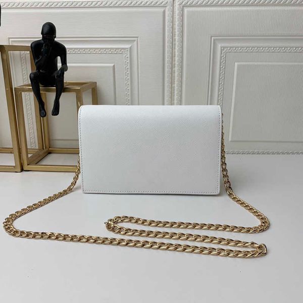 a designer white shoulder bag for girls with a lovely bridal slanted purse in luxury leather
a designer white shoulder bag for girls with a lovely bridal slanted purse in luxury leather