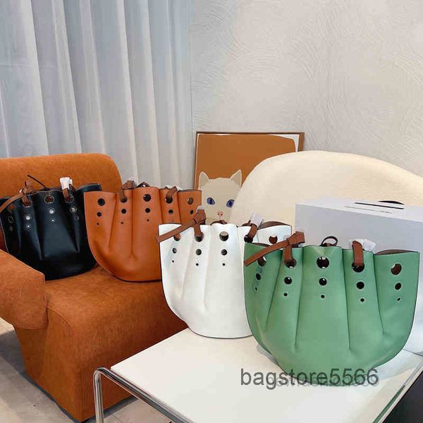 designer shell bag tote women pleated perforated handbag shoulder soft leather luxury designer brand crobody female bucket 2022
designer shell bag tote women pleated perforated handbag shoulder soft leather luxury designer brand crobody female bucket 2022